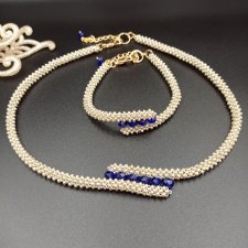 Komplet biżuterii naszyjnik i bransoletka z drobnych koralików w białym złocie